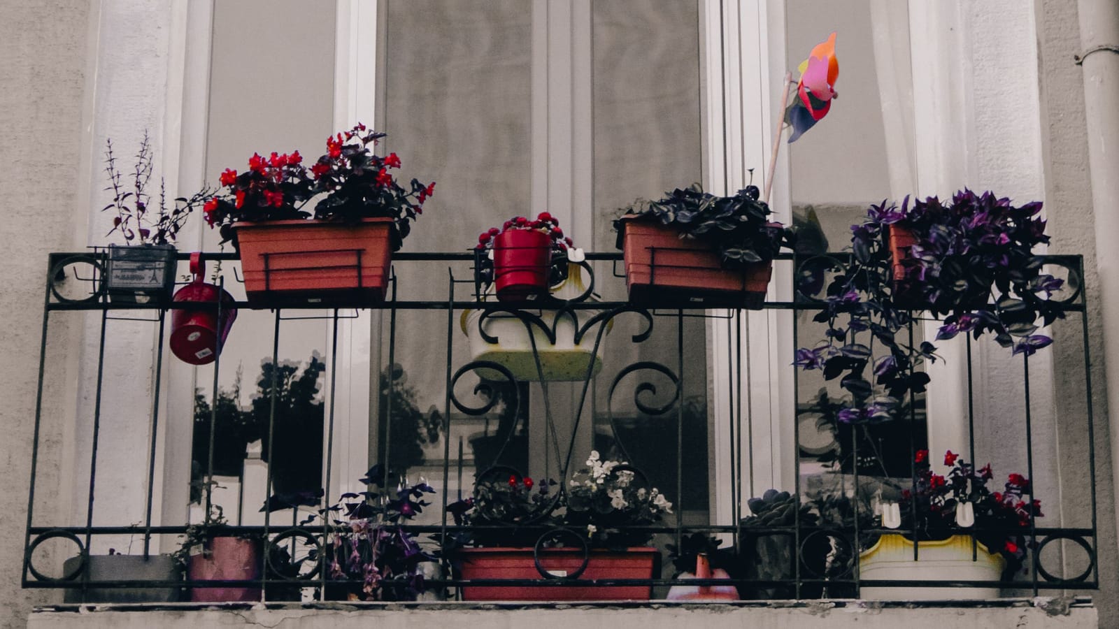 Balcony with potted flowers on an apartment building in Istanbul