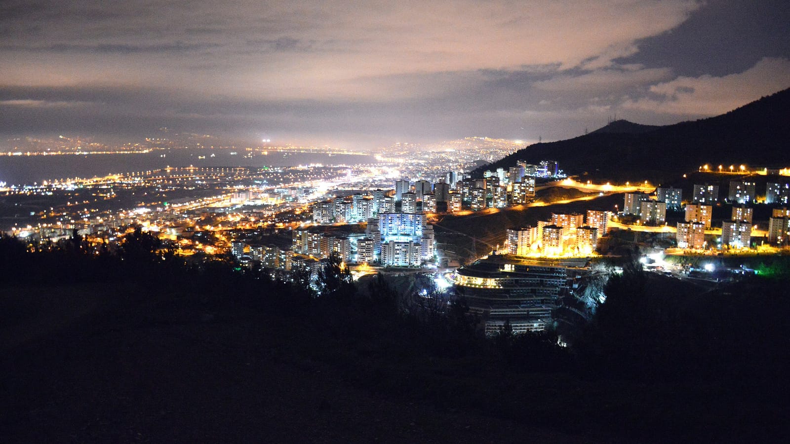 The bay of İzmir and city lights at night